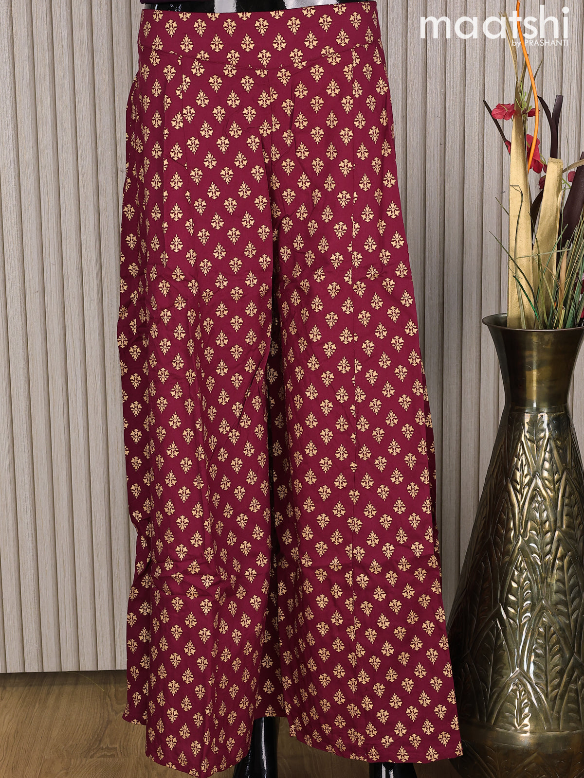 Cotton palazzo pant maroon and with allover golden floral prints Maatshi