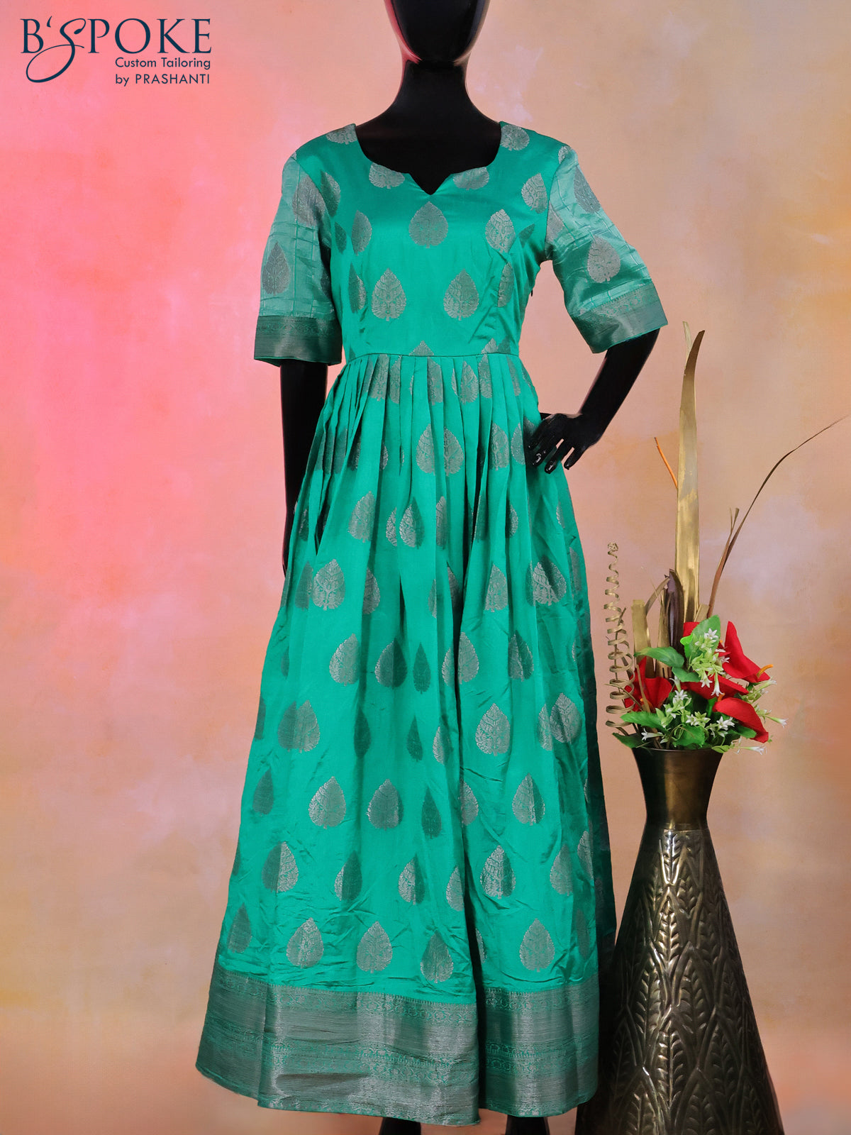 Raw silk floor length kurti teal green with silver zari buttas and back design