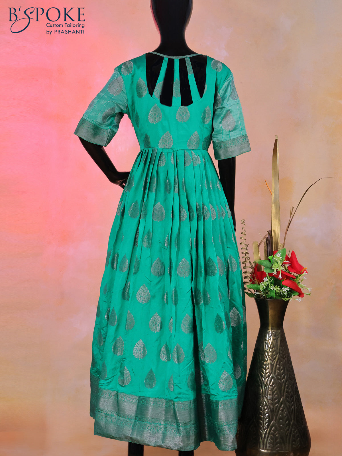 Raw silk floor length kurti teal green with silver zari buttas and back design