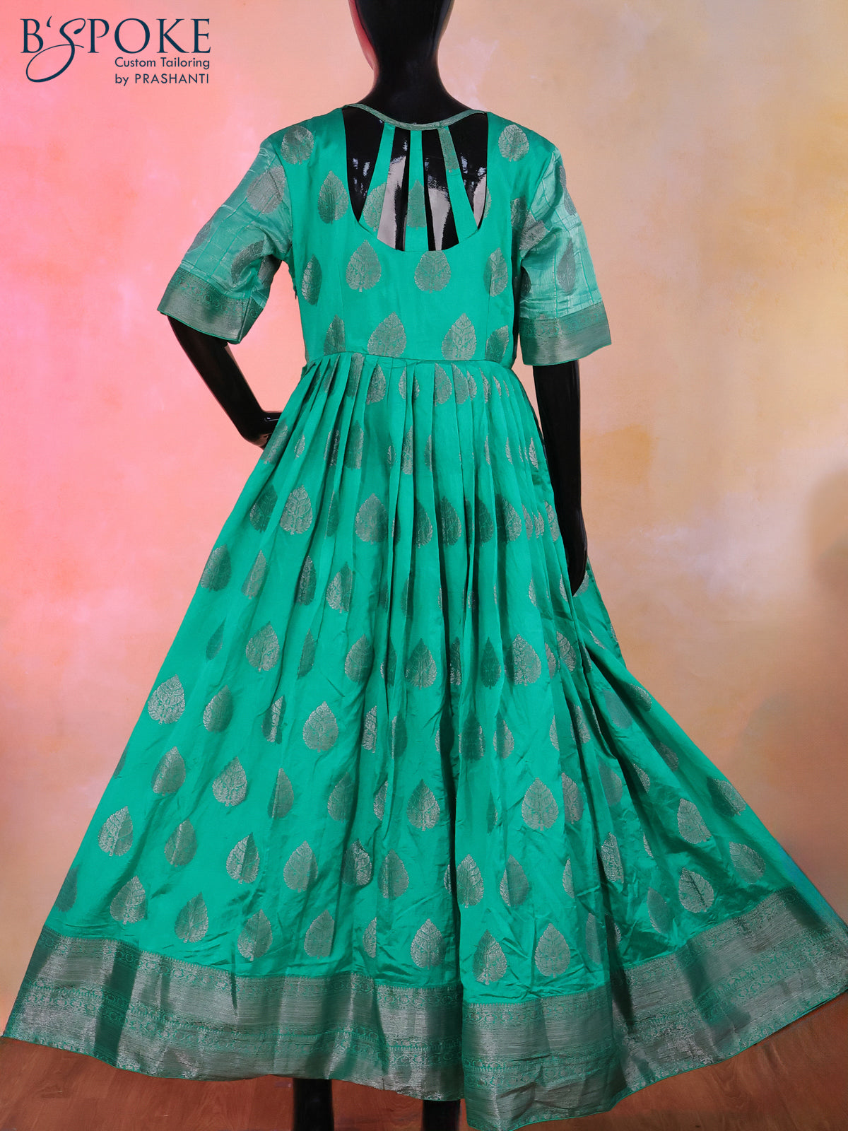 Raw silk floor length kurti teal green with silver zari buttas and back design