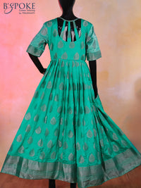 Raw silk floor length kurti teal green with silver zari buttas and back design