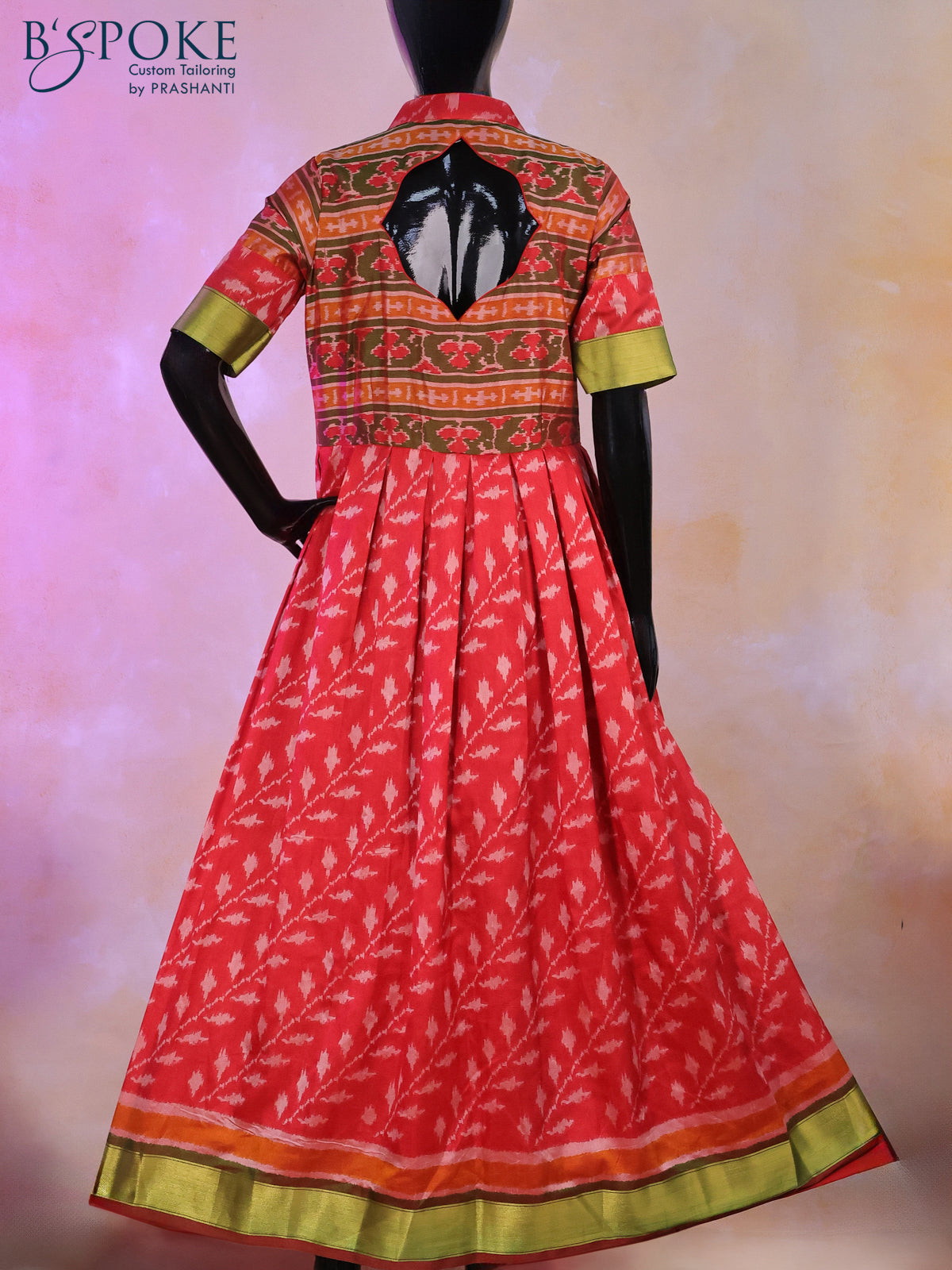 Semi tussar anarkali kurti dual shade of green and red with allover ikat weaves & collar neck pattern and back design