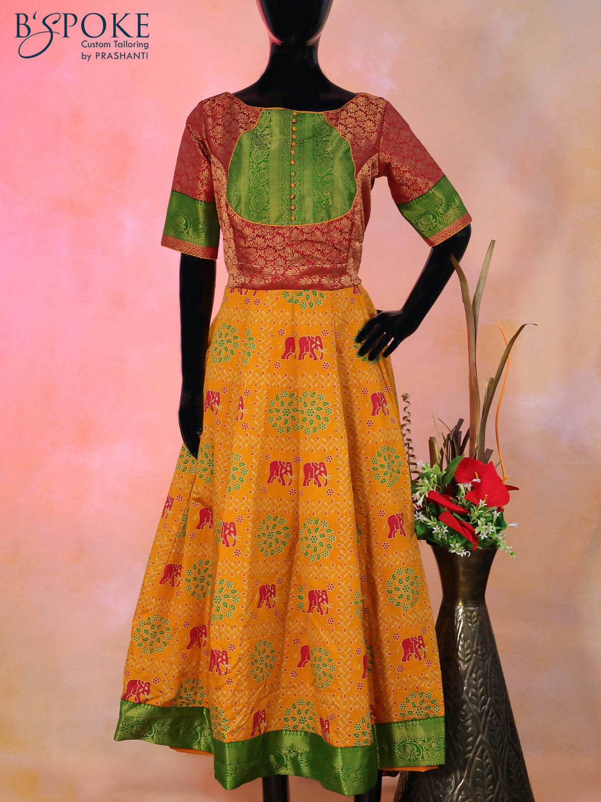 Semi tussar anarkali kurti maroon and mustard yellow with allover elephant butta prints & brocade weaves and simple neck pattern