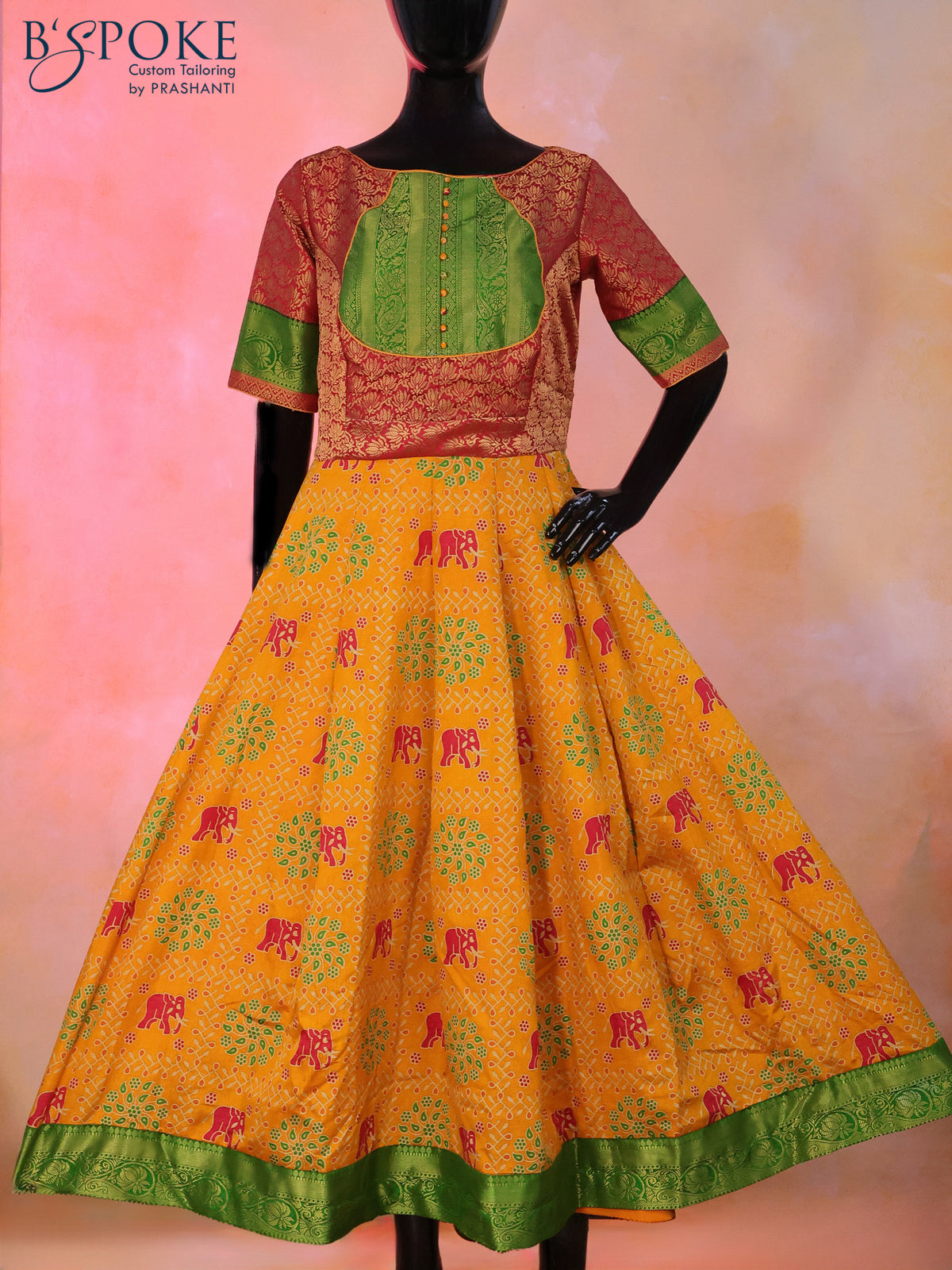 Semi tussar anarkali kurti maroon and mustard yellow with allover elephant butta prints & brocade weaves and simple neck pattern