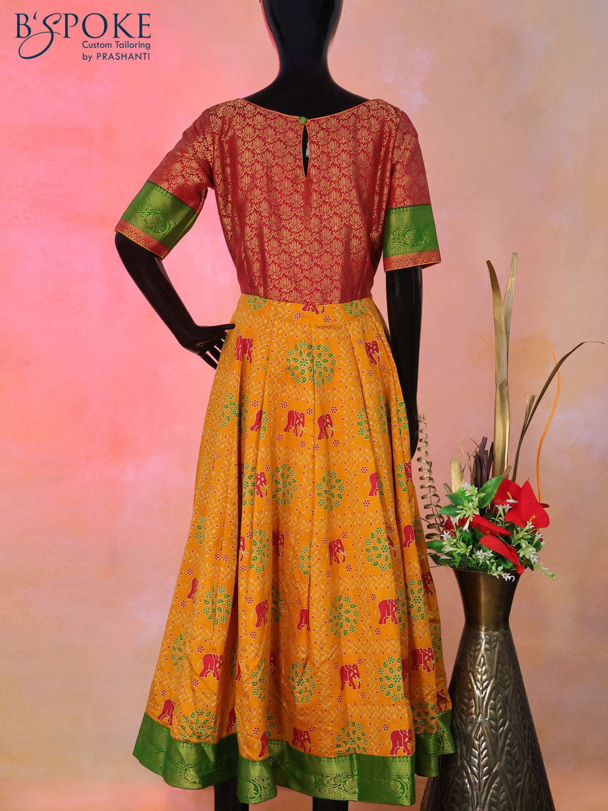 Semi tussar anarkali kurti maroon and mustard yellow with allover elephant butta prints & brocade weaves and simple neck pattern