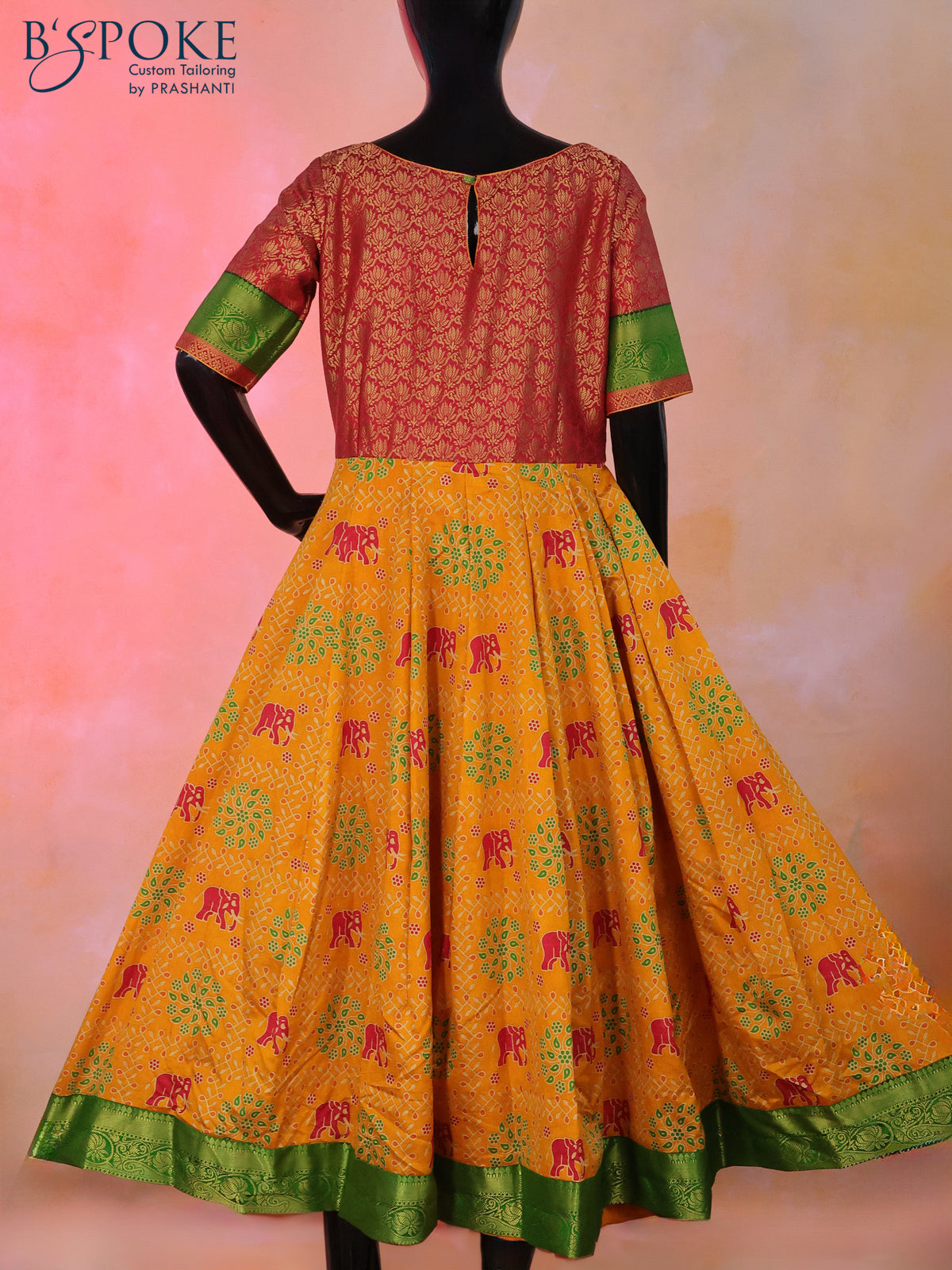 Semi tussar anarkali kurti maroon and mustard yellow with allover elephant butta prints & brocade weaves and simple neck pattern