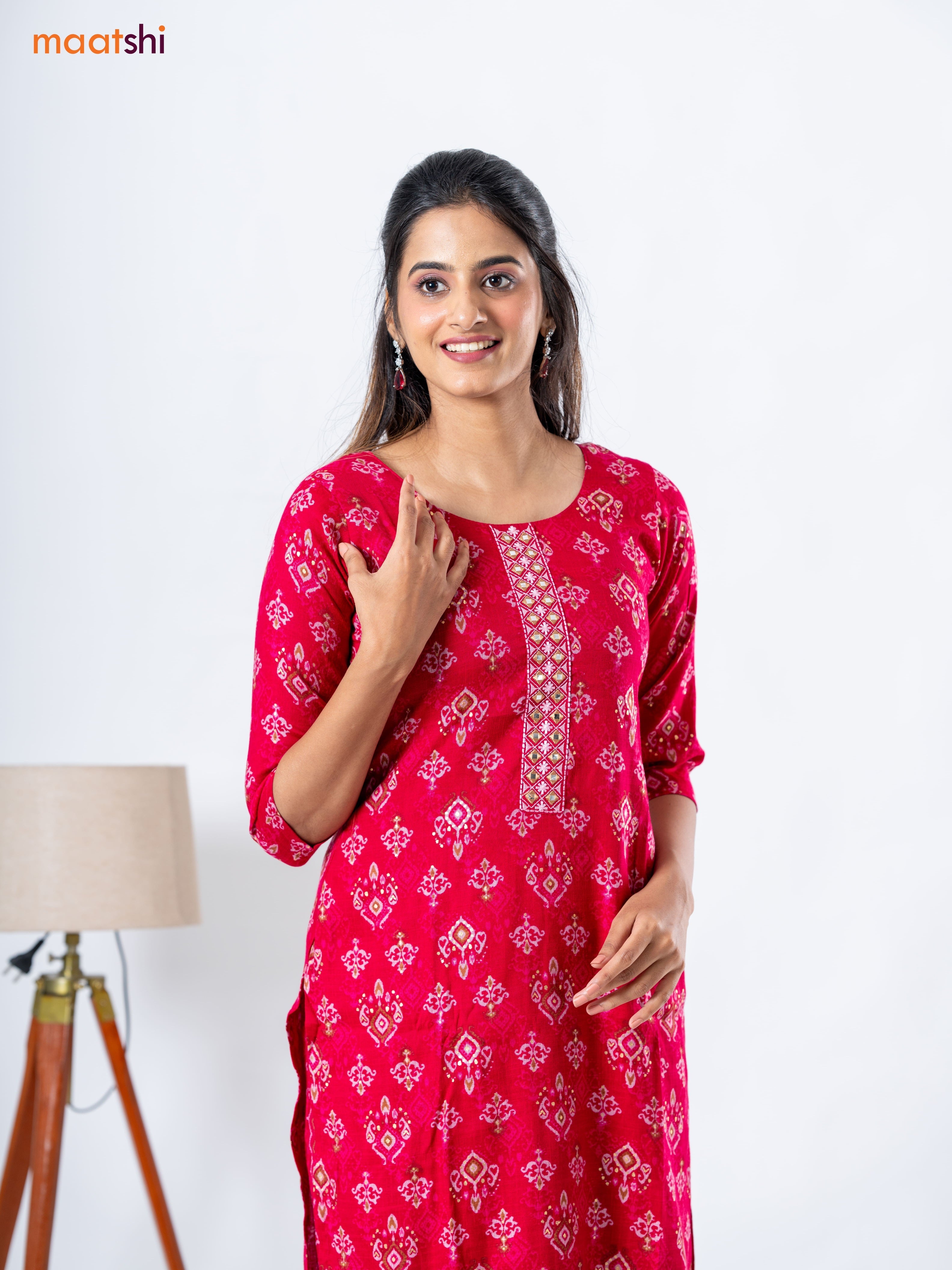 Rayon readymade kurti set pink with allover ikat prints &embroidery work neck pattern and straight cut pant