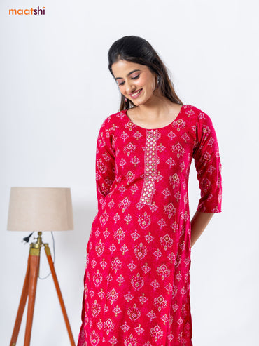 Rayon readymade kurti set pink with allover ikat prints &embroidery work neck pattern and straight cut pant