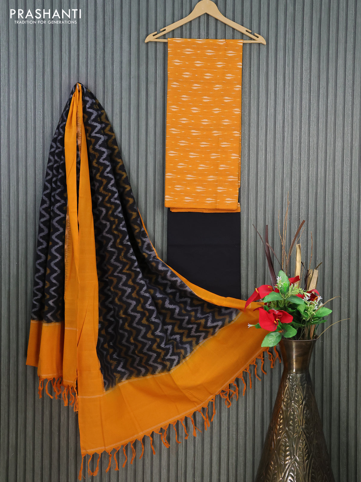 Ikat cotton dress material mustard yellow and black with allover ikat butta weaves and bottom & dupatta