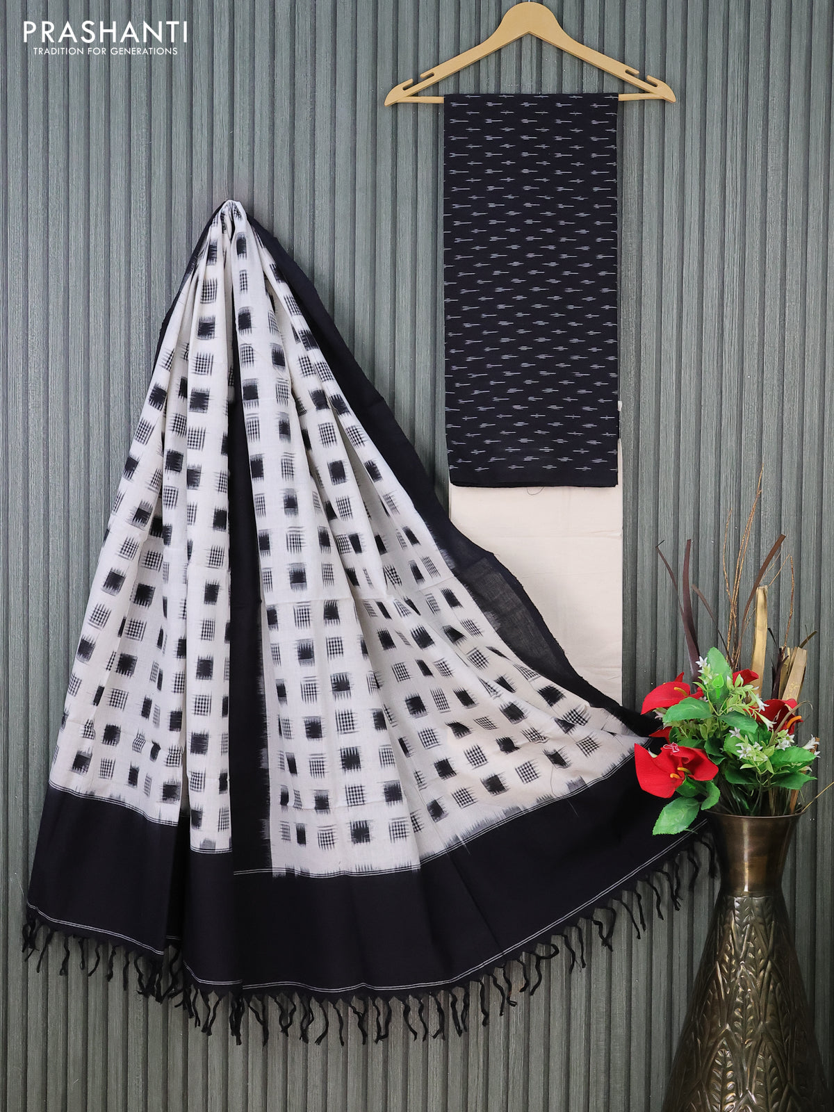 Ikat cotton dress material black and cream with allover ikat butta weaves and bottom & dupatta