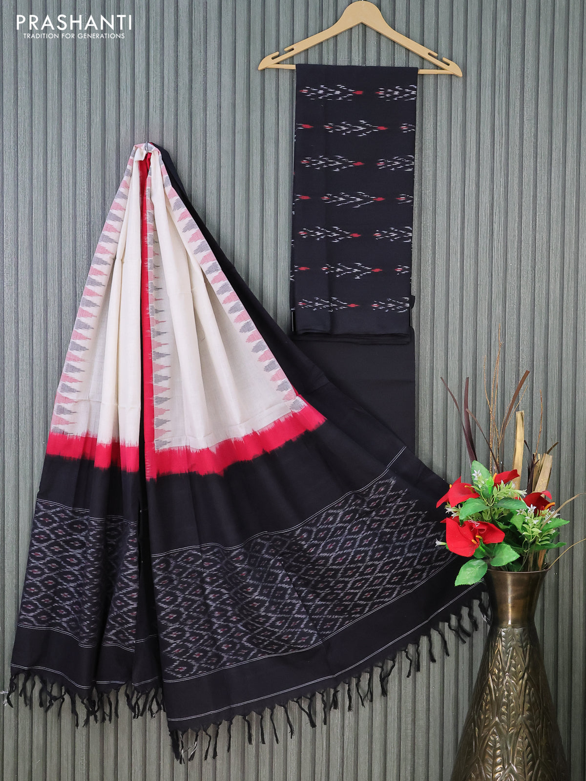 Ikat cotton dress material black with allover ikat butta weaves and bottom & dupatta