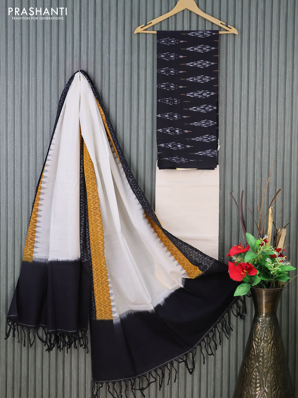 Ikat cotton dress material black and cream with allover ikat butta weaves and bottom & dupatta