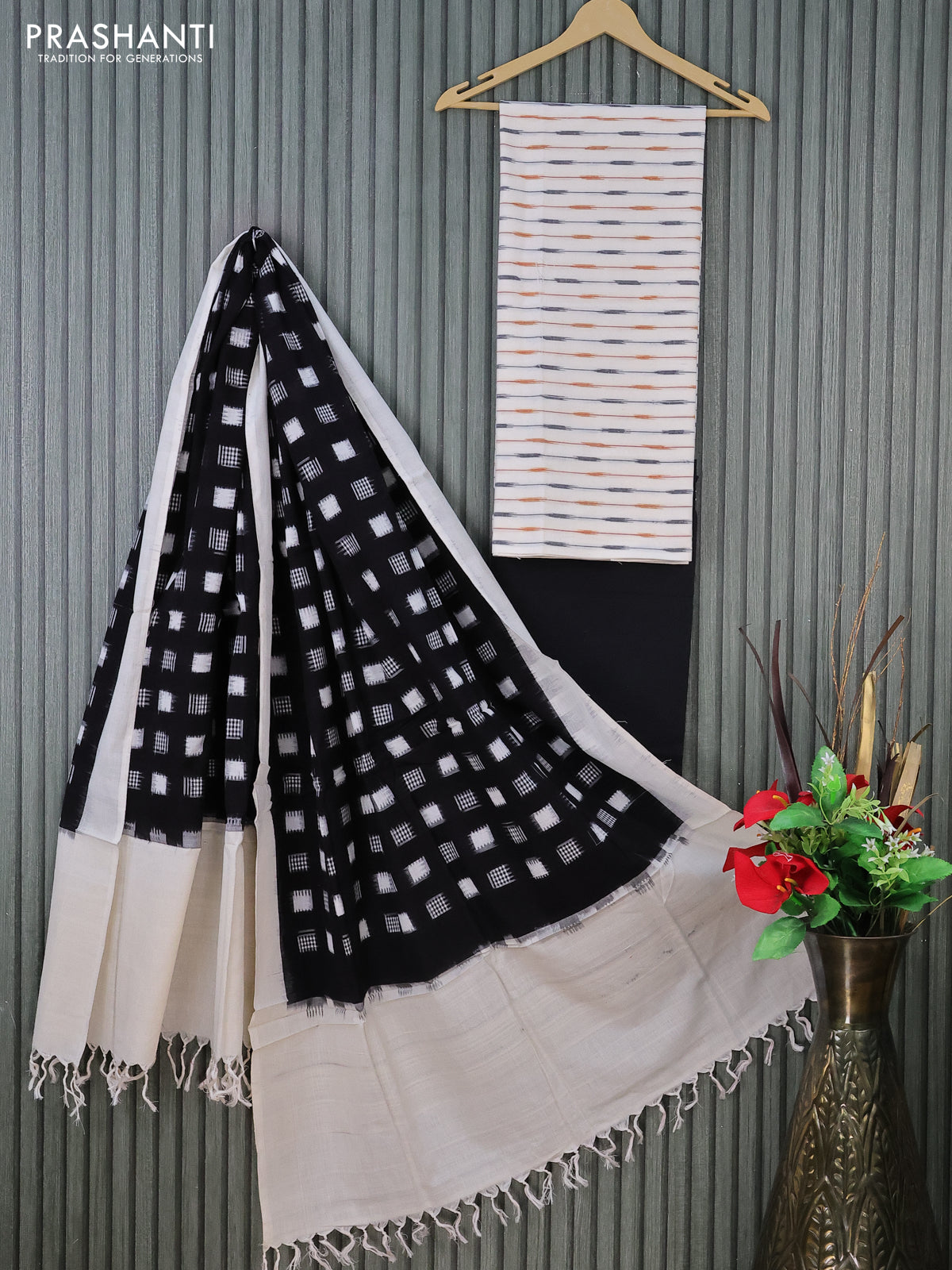 Ikat cotton dress material cream and black with allover ikat weaves and bottom & dupatta