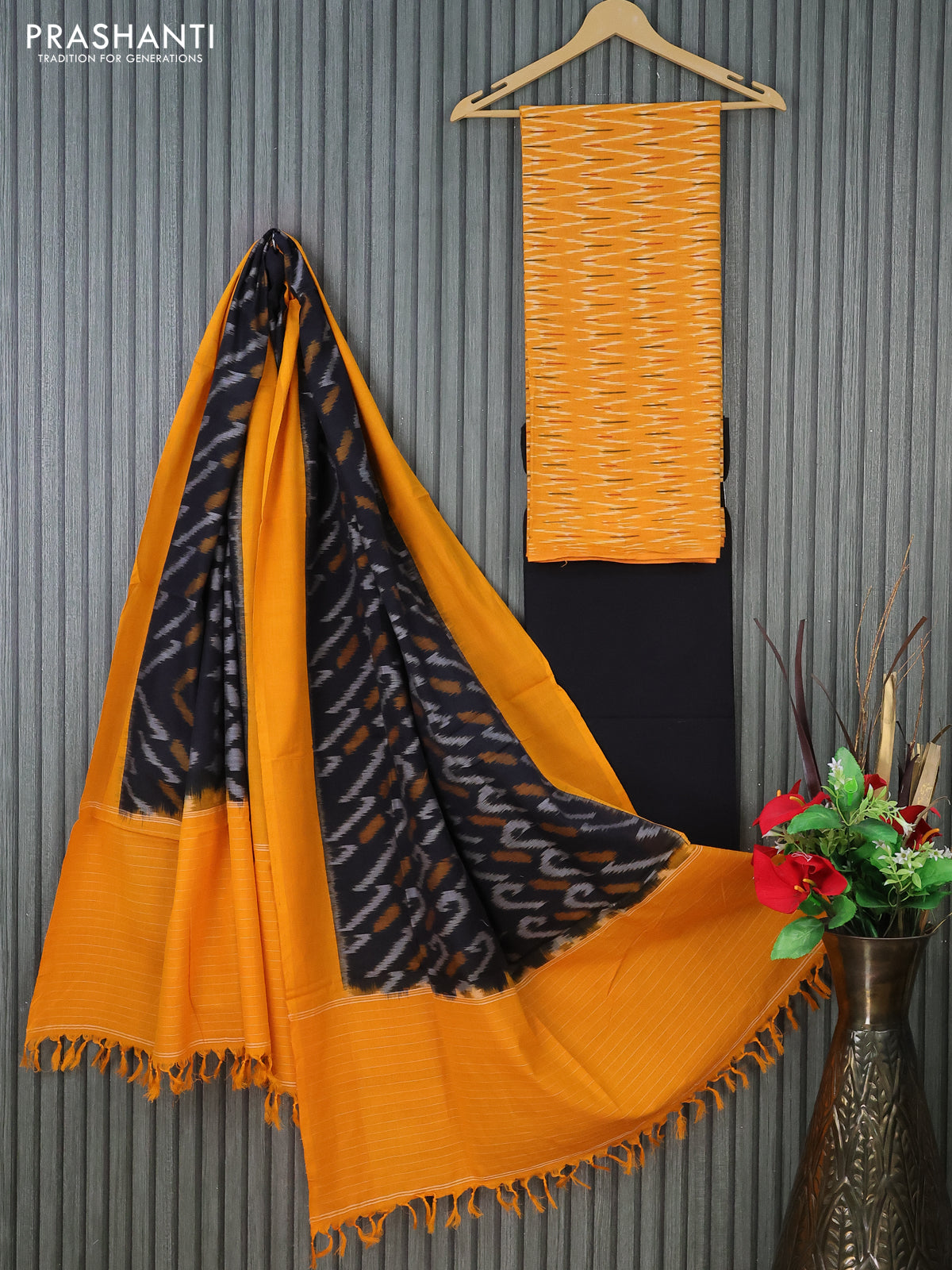 Ikat cotton dress material mustard yellow and black with allover ikat weaves and bottom & dupatta