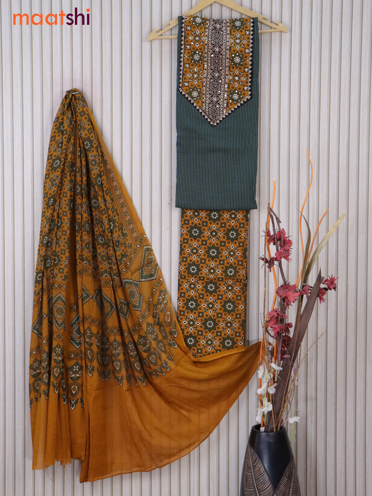 Cotton dress material dark green and mustard yellow with allover thread weaves & ajrakh prints neck pattern and bottom & ajrakh printed dupatta