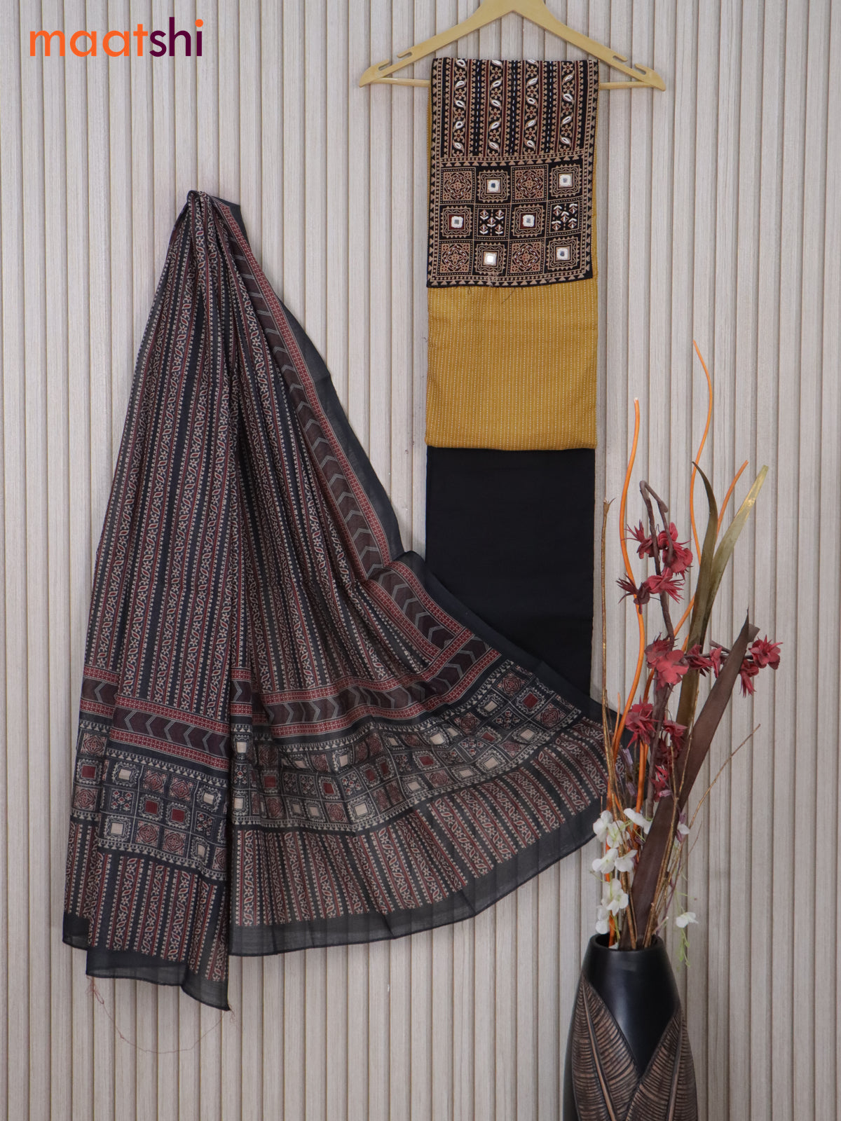 Cotton dress material mustard yellow and black with allover thread weaves & ajrakh prints and bottom & printed dupatta