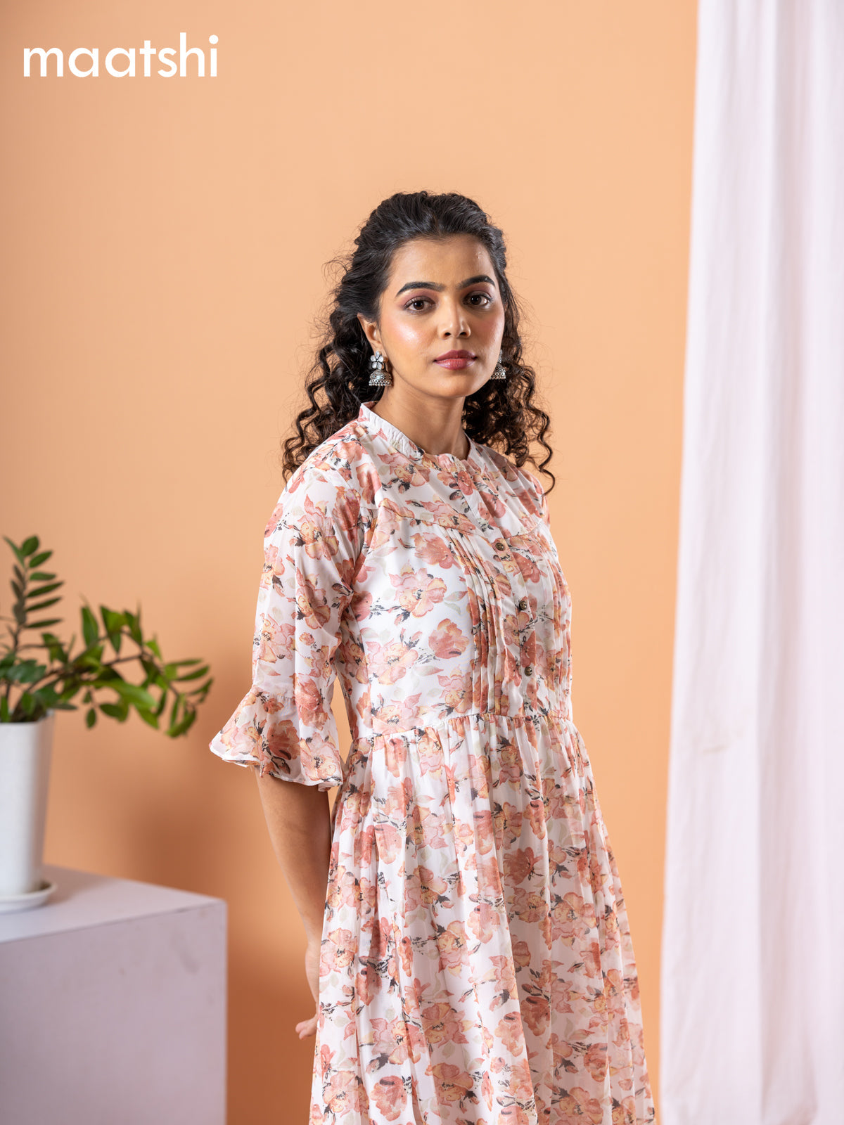 Chiffon dress off white and peach shade with allover floral prints & simple neck pattern without pant