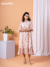 Chiffon dress off white and peach shade with allover floral prints & simple neck pattern without pant