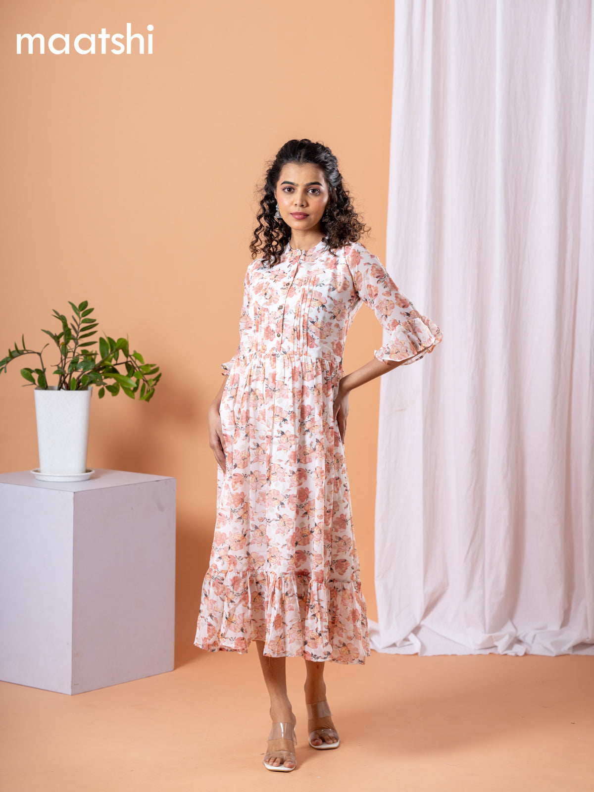 Chiffon dress off white and peach shade with allover floral prints & simple neck pattern without pant