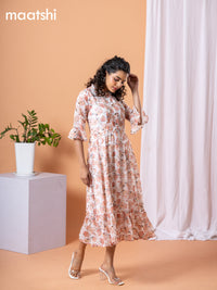 Chiffon dress off white and peach shade with allover floral prints & simple neck pattern without pant