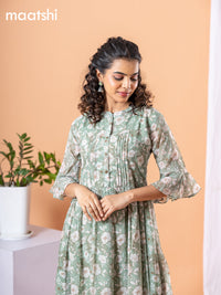 Chiffon dress pastel green with allover floral prints & simple neck pattern without pant