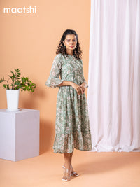 Chiffon dress pastel green with allover floral prints & simple neck pattern without pant