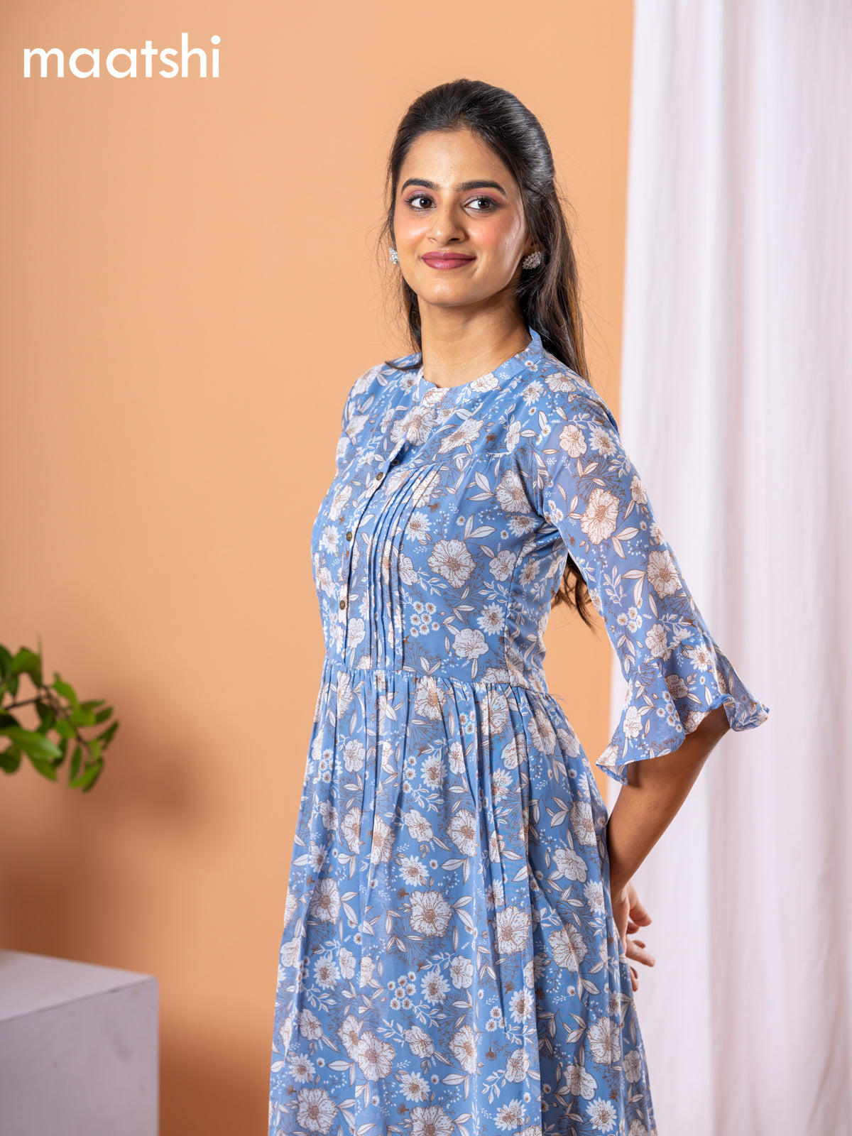 Chiffon dress blue shade with allover floral prints & simple neck pattern without pant