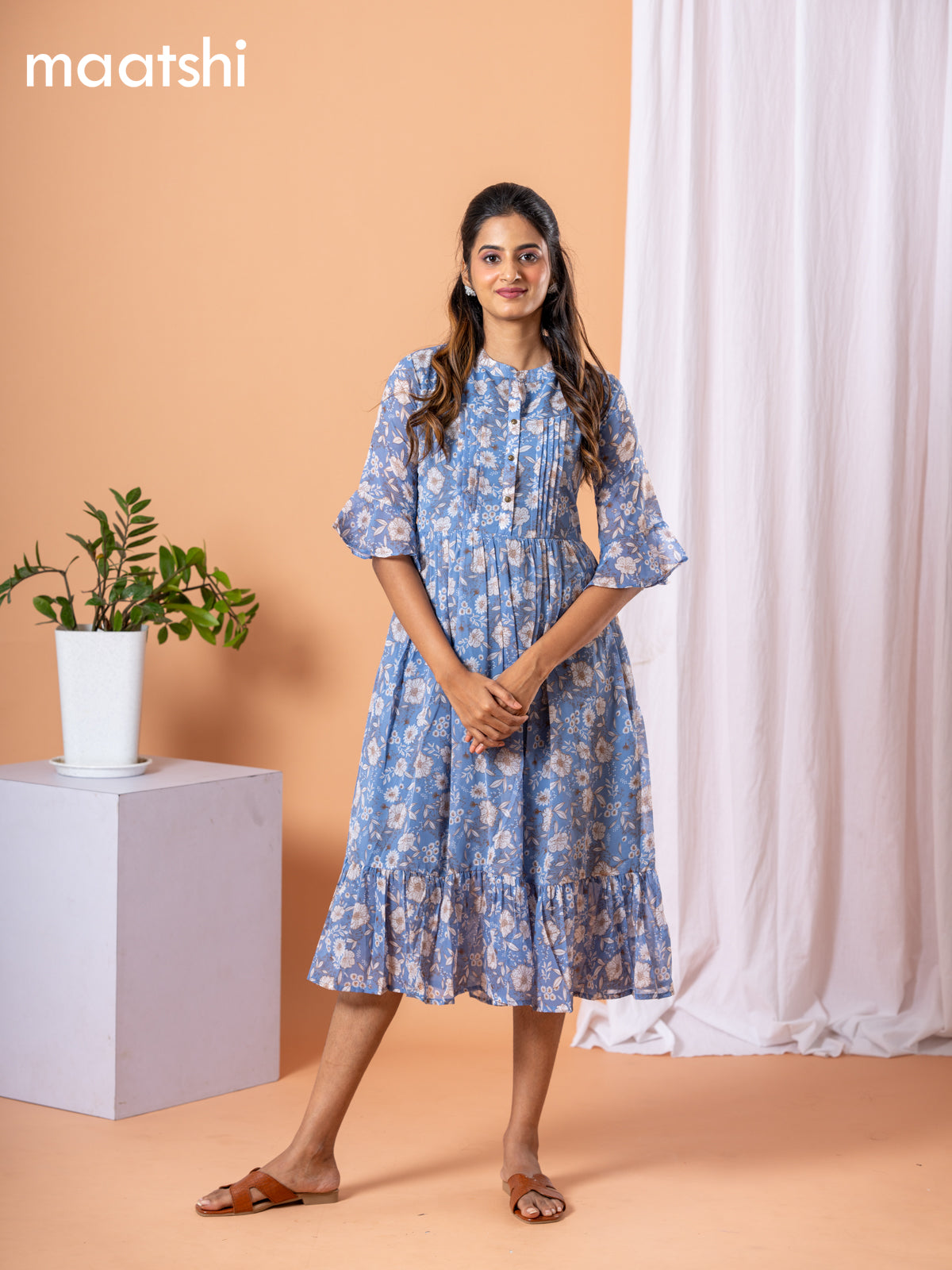 Chiffon dress blue shade with allover floral prints & simple neck pattern without pant