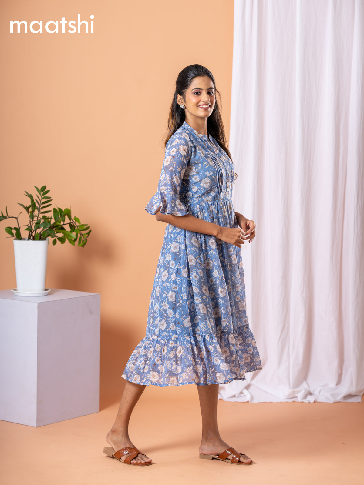 Chiffon dress blue shade with allover floral prints & simple neck pattern without pant