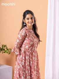 Chiffon dress peach shade with allover floral prints & simple neck pattern without pant