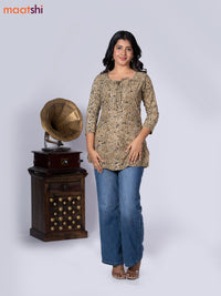 Kalamkari cotton short kurti mehendi green shade and beige with allover prints & lace work neck pattern without pant