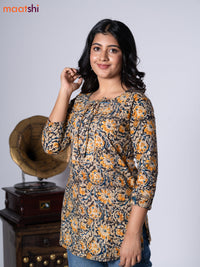 Kalamkari cotton short kurti multi colour and yellow shade with allover prints & lace work neck pattern without pant