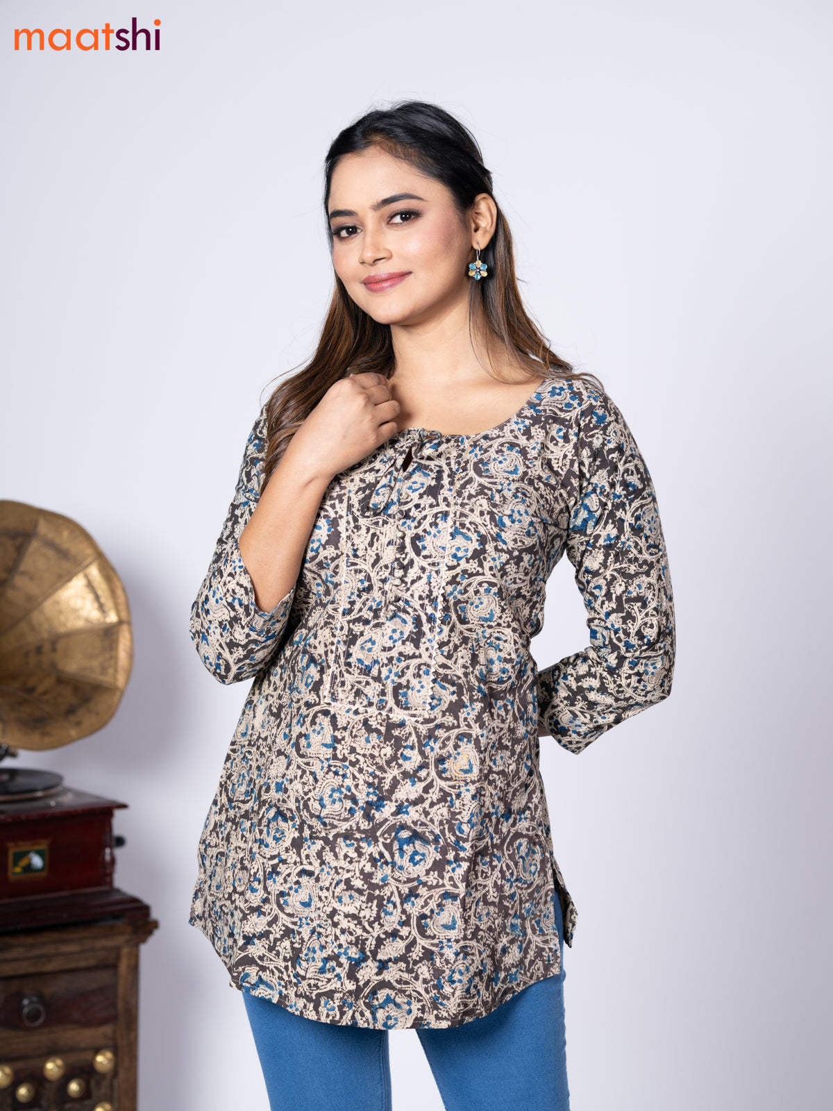 Kalamkari cotton short kurti black and beige with allover prints & lace work neck pattern without pant