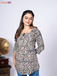 Kalamkari cotton short kurti black and beige with allover prints & lace work neck pattern without pant