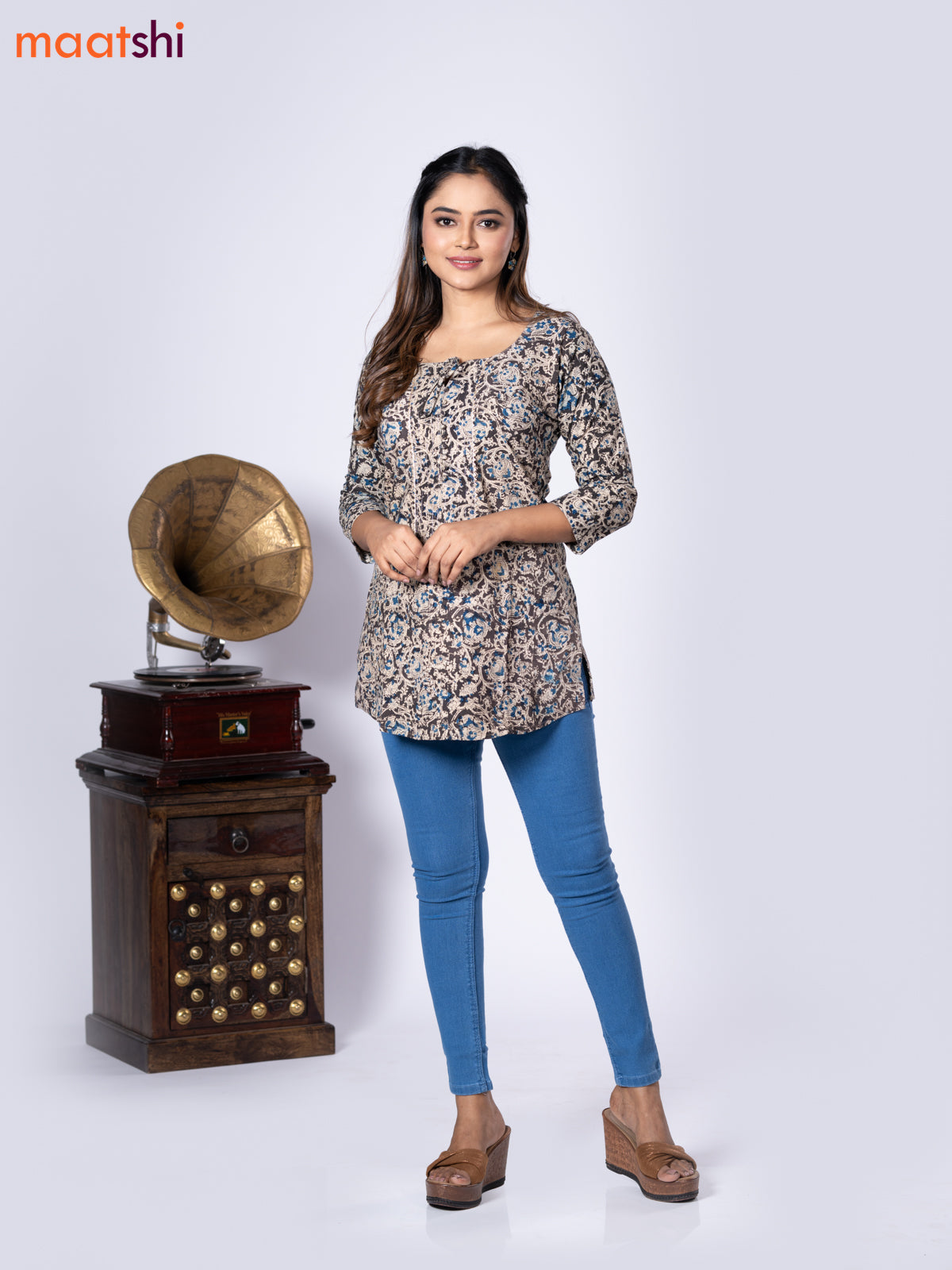 Kalamkari cotton short kurti black and beige with allover prints & lace work neck pattern without pant