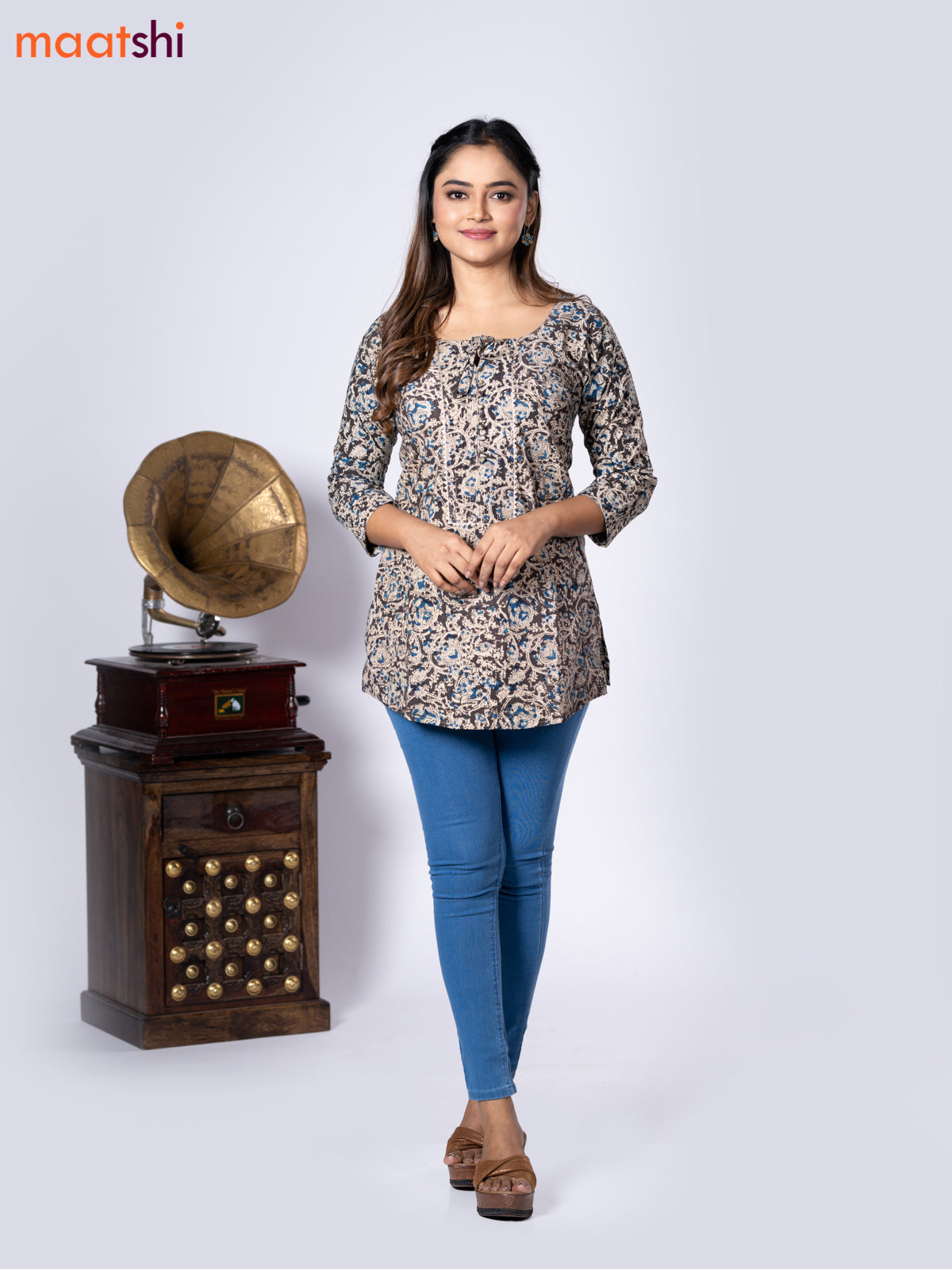 Kalamkari cotton short kurti black and beige with allover prints & lace work neck pattern without pant