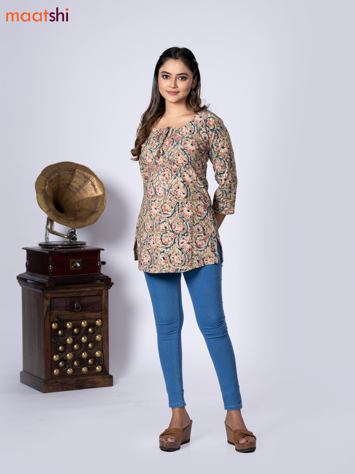 Kalamkari cotton short kurti mehendi green shade and beige with allover prints & lace work neck pattern without pant