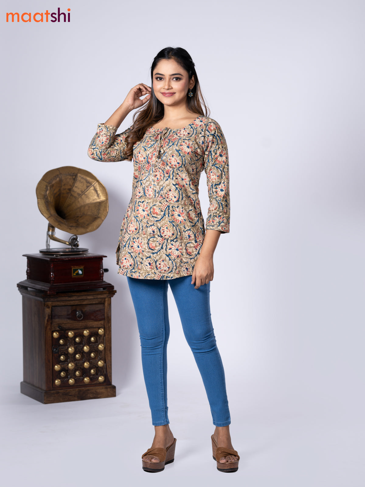 Kalamkari cotton short kurti mehendi green shade and beige with allover prints & lace work neck pattern without pant