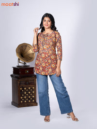 Kalamkari cotton short kurti maroon and beige with allover prints & lace work neck pattern without pant