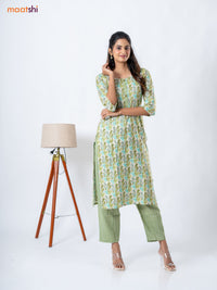 Rayon readymade kurti set cream and mehendi green with allover ikat prints & patch work neck pattern and straight cut pant