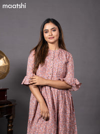 Soft rayon readymade dress peach shade with allover floral prints & simple collar neck design without pant