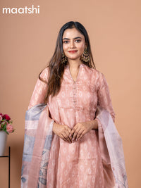 Tissue anarkali salwar suit pastel peach with allover ikat buttas & simple neck pattern and straight cut pant & floral prints tissue dupatta