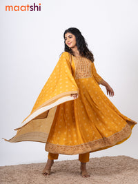 Muslin readymade anarkali salwar suits mustard yellow with allover bandhani prints & beaded work neck pattern and straight cut pant & kalamkari printed dupatta