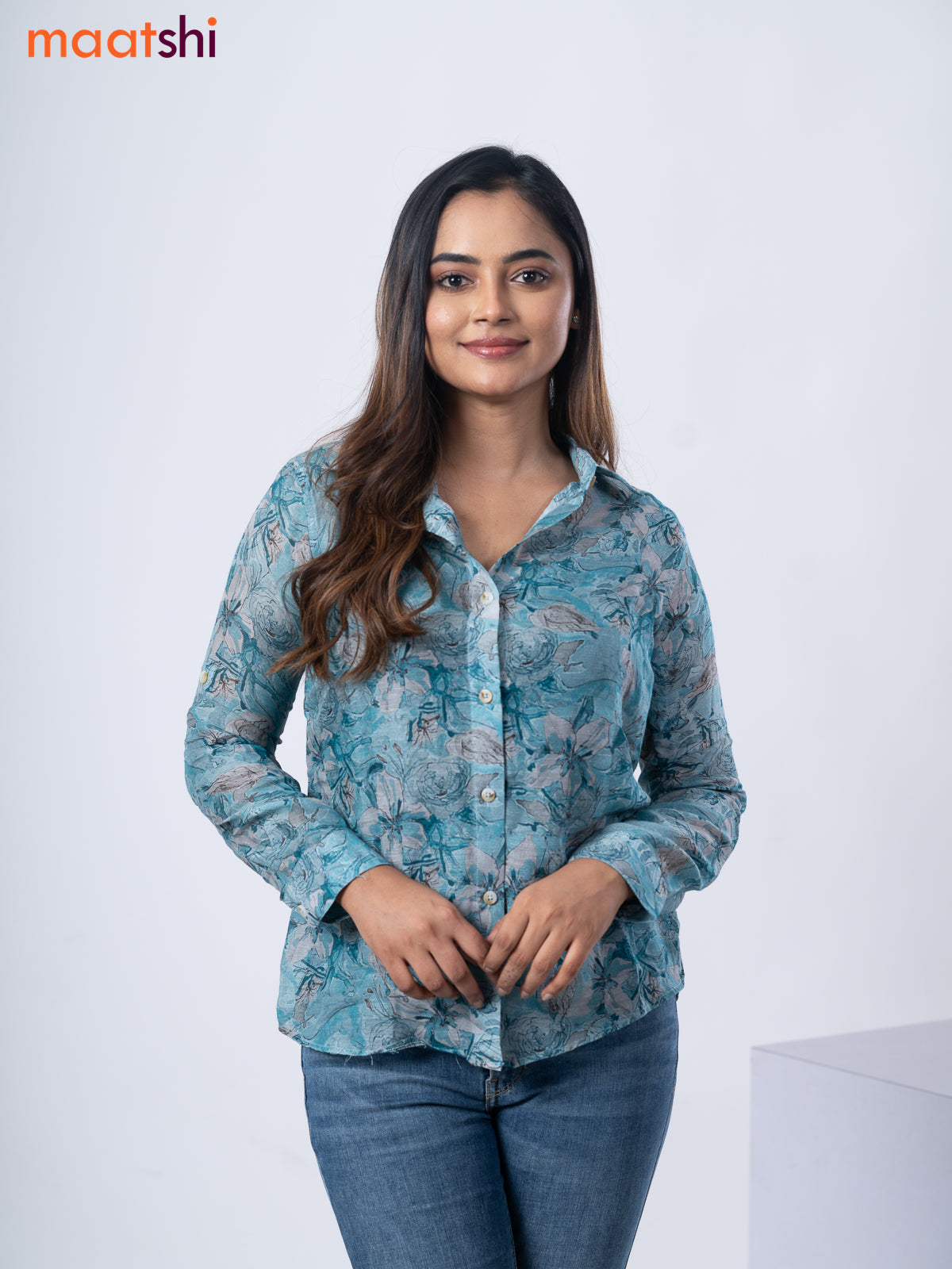 Women's shirt pastel blue and grey with allover floral prints and collar neck pattern