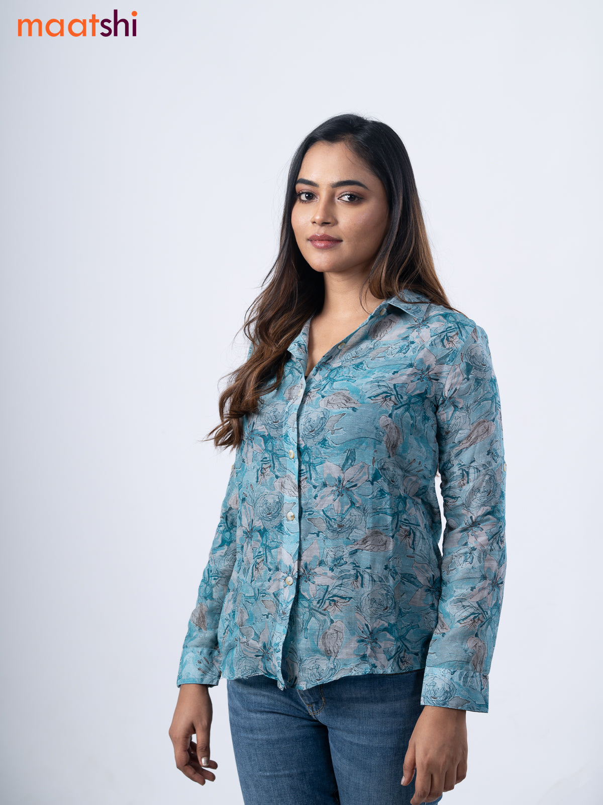 Women's shirt pastel blue and grey with allover floral prints and collar neck pattern