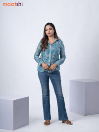 Women's shirt pastel blue and grey with allover floral prints and collar neck pattern