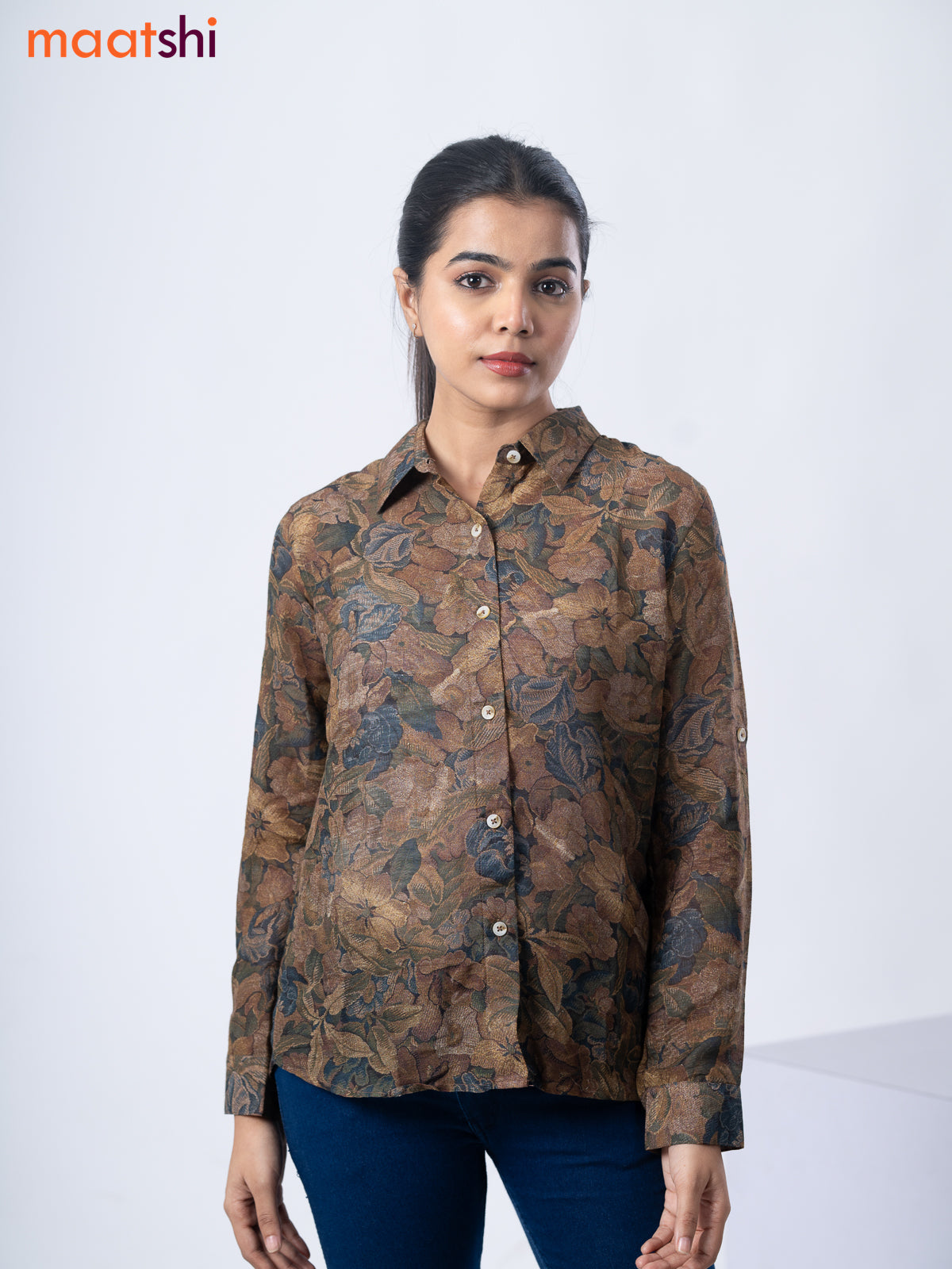 Women's shirt pastel brown shade with allover floral prints and collar neck pattern