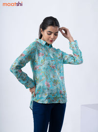 Women's shirt teal blue with allover floral prints and collar neck pattern