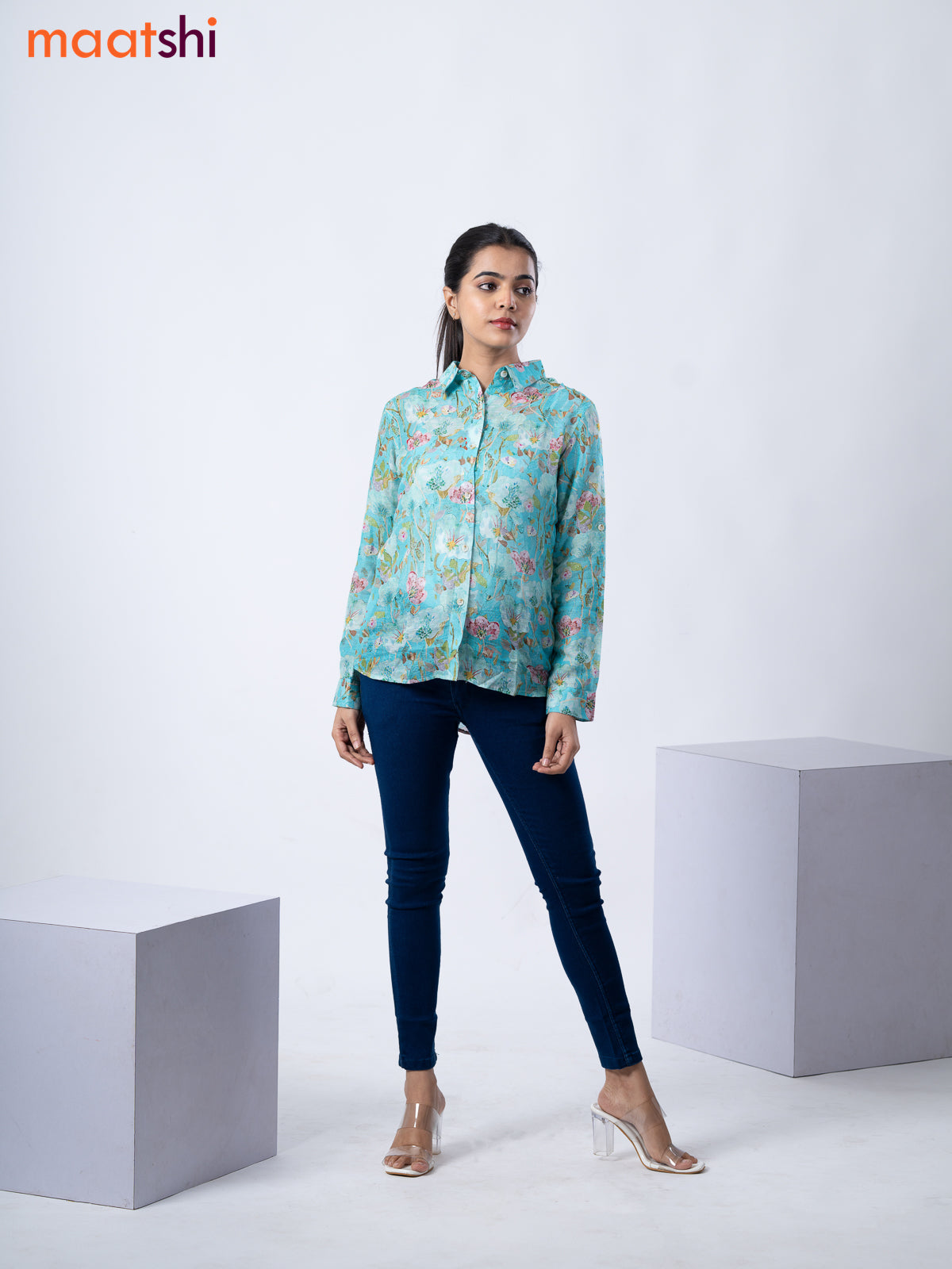 Women's shirt teal blue with allover floral prints and collar neck pattern