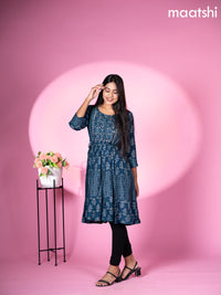 Muslin reaymade short umbrella kurti peacock blue with allover prints & mirror work neck pattern without pant